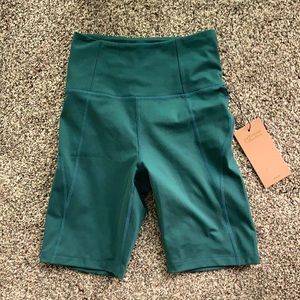 High rise biker shorts in Moss-forest green color